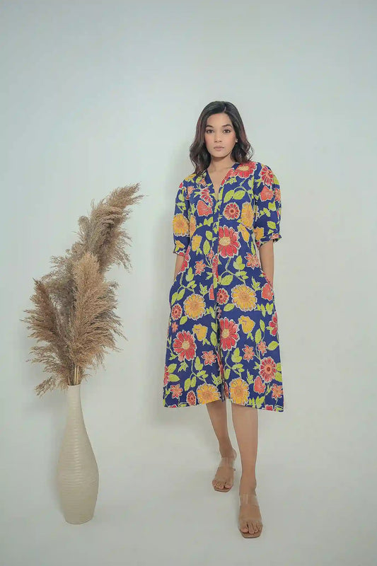Tea & Dove celestial bloom floral linen midi colourful dress with short puff sleeves and pockets.