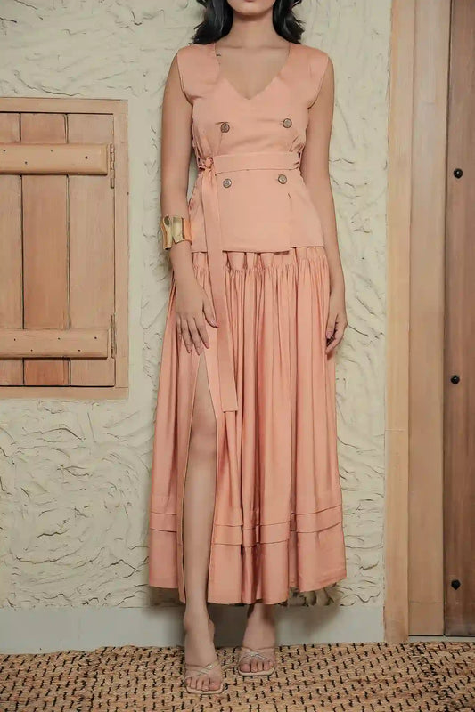 Close up front view of Mira Duo Italian clay cotton satin waistcoat and gathered maxi skirt with high leg slit.