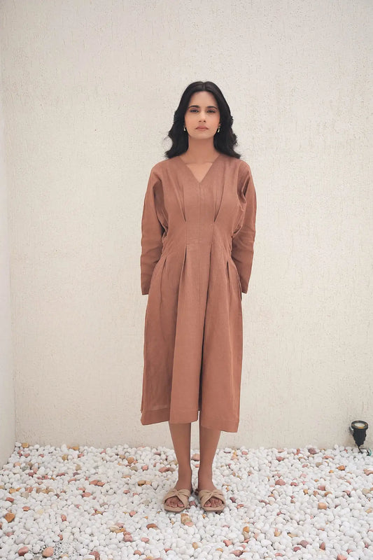 Full-length front view of TEA&DOVE long sleeve linen dress in nutshell brown color